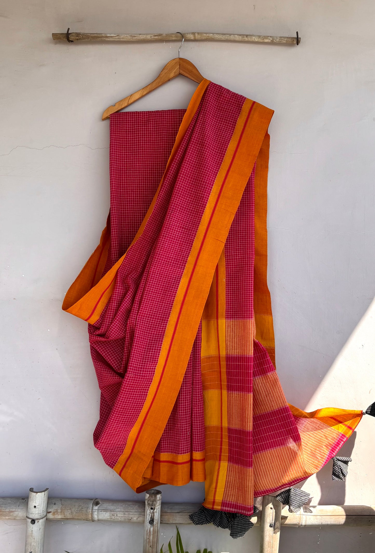 Light Red Checkered Patteda Anchu Saree with Yellow Border